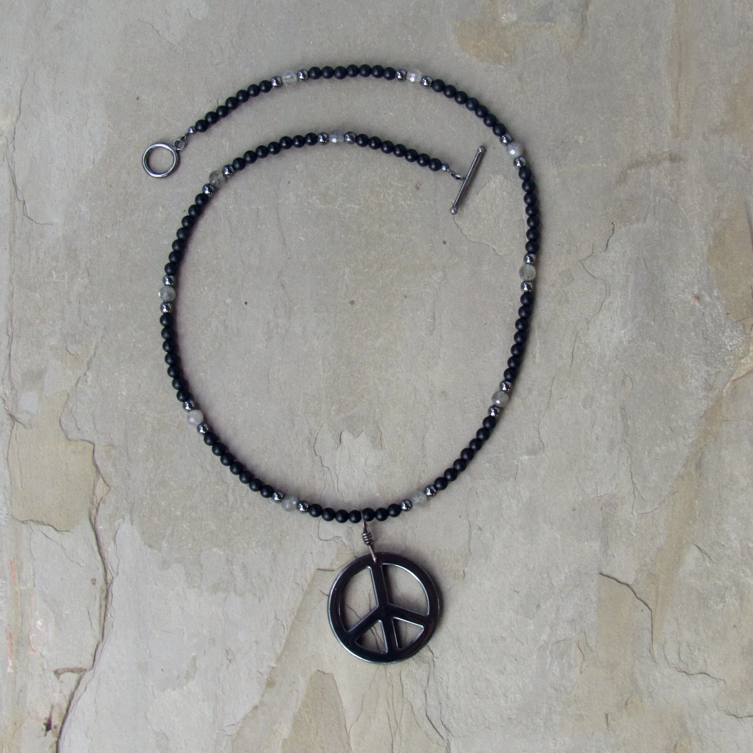 Hematite Peace Pendant, Hand Wrapped w/ Oxidized Sterling Silver, Matte Black Onyx, and Labradorite Men’s Necklace